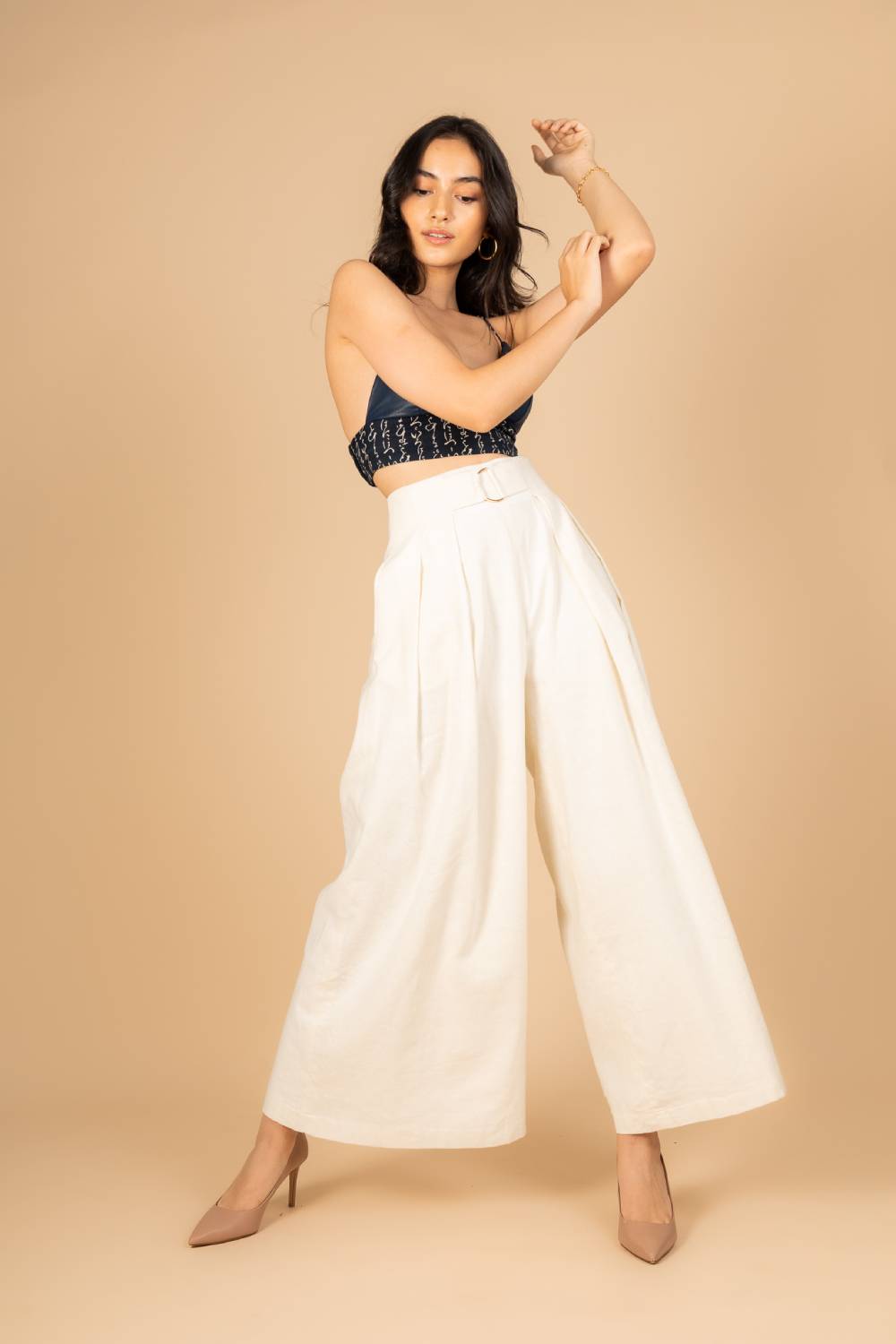 Image for The Hakama, featuring an image of the model wearing HAKAMA 袴 High Waisted Pleated Pants from FLAIR® By Tori. Also known as wide leg pants or Hakama pants.